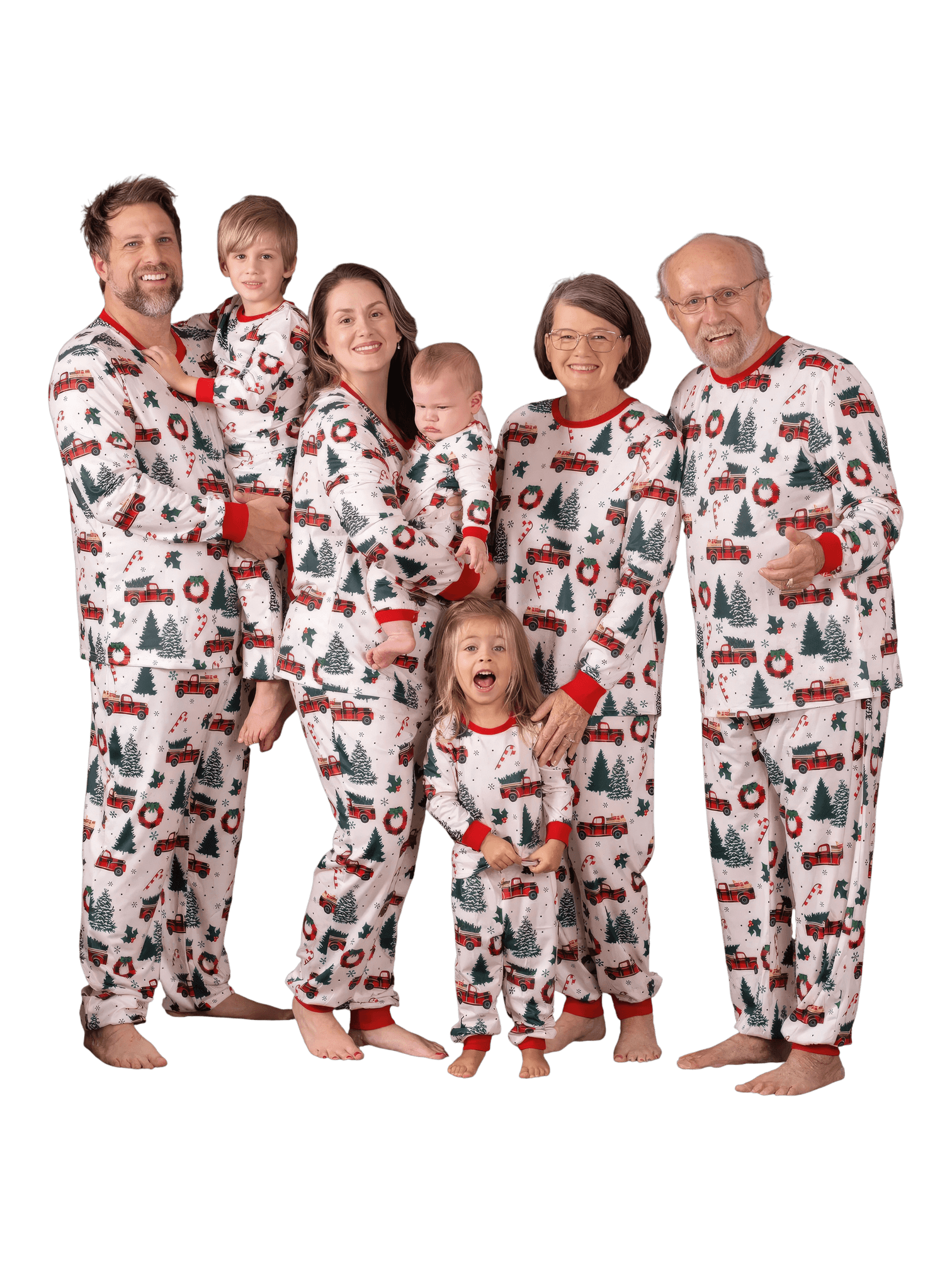 Superb white pyjamas with Christmas trees red trucks motifs for all the family