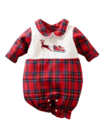 Vintage baby julpyjamas, broderad med en flygande ren och släde, röd och vit.