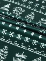 Modern green Christmas pyjamas with winter motifs, snowflakes, fir trees