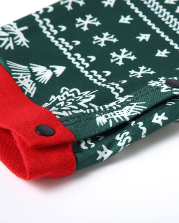 Modern green Christmas pyjamas with winter motifs, snowflakes, fir trees