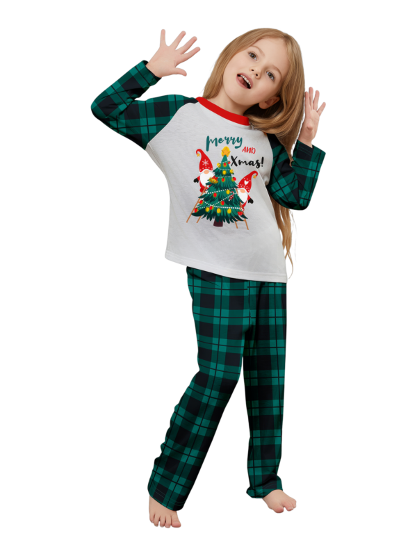 Christmas tree decorated by elves, printed “Merry Christmas”