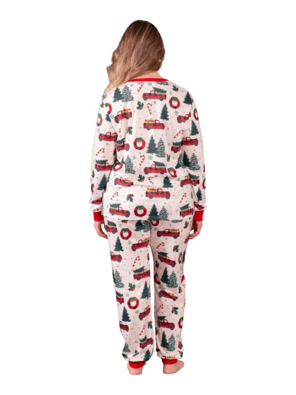 Superb white pyjamas with Christmas trees red trucks motifs for all the family