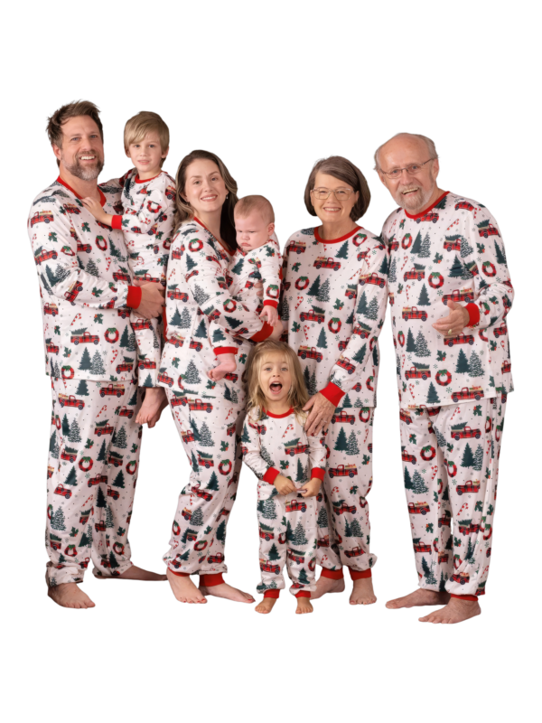 Superb white pyjamas with Christmas trees red trucks motifs for all the family